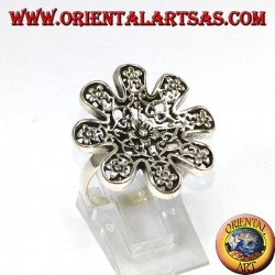 Silver ring in the shape of a flower with pierced roses
