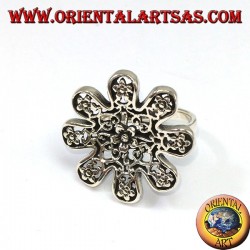 Silver ring in the shape of a flower with pierced roses