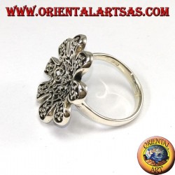 Silver ring in the shape of a flower with pierced roses