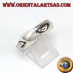 Anillo de plata, sonrisa tallada
