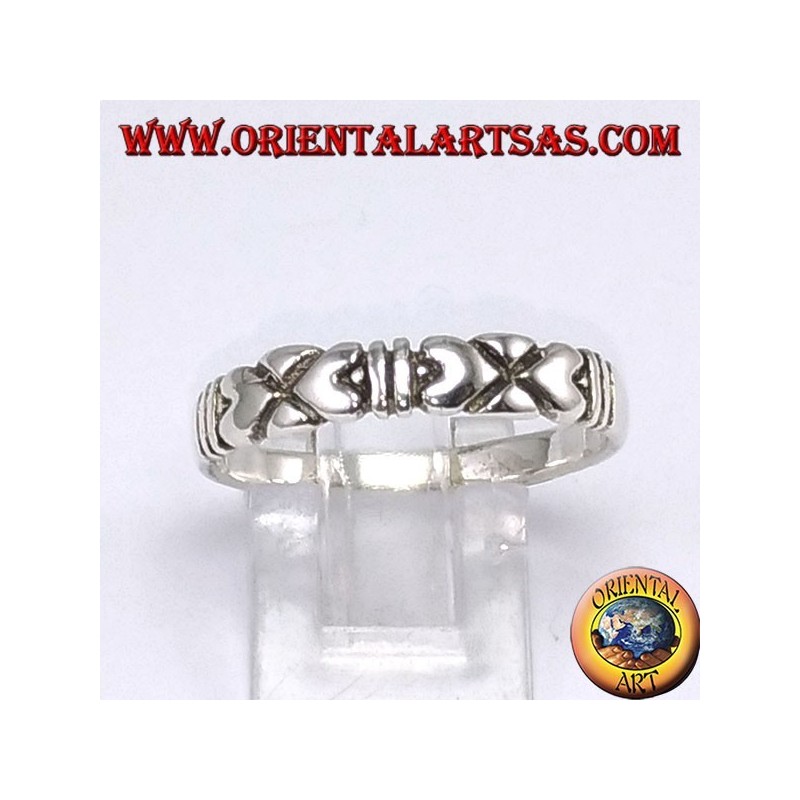 Anillo de plata, con corazones opuestos