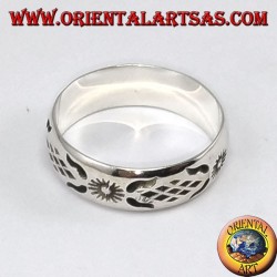 Silver ring with sun carved by hand