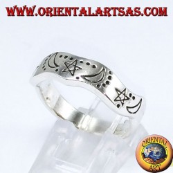 Corrugated silver ring with hand-carved star and moons