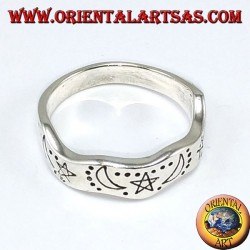 Corrugated silver ring with hand-carved star and moons