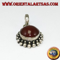 Silver pendant with round carnelian and border with two rounds of spheres