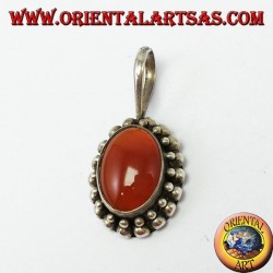 Silver pendant with oval carnelian, with the edge has two rounds of spheres