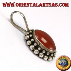 Silver pendant with oval carnelian, with the edge has two rounds of spheres