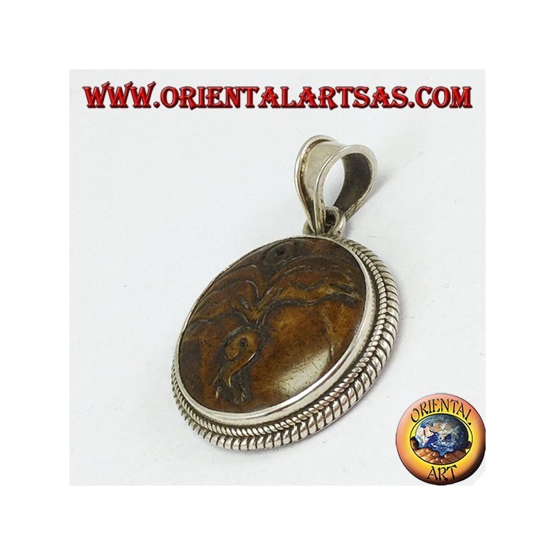 Pendentif en argent oeil de Bouddha sculpté en os de yack