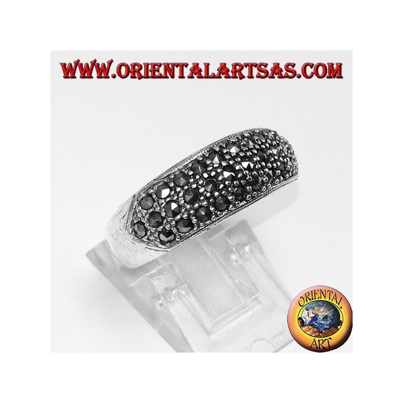 Silver ring with a rounded band with three rows of marcasite