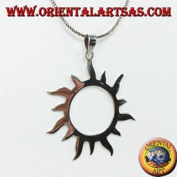 Silver pendant with sun rays