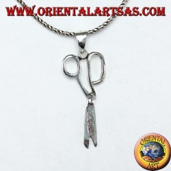 Silver pendant in the shape of scissors