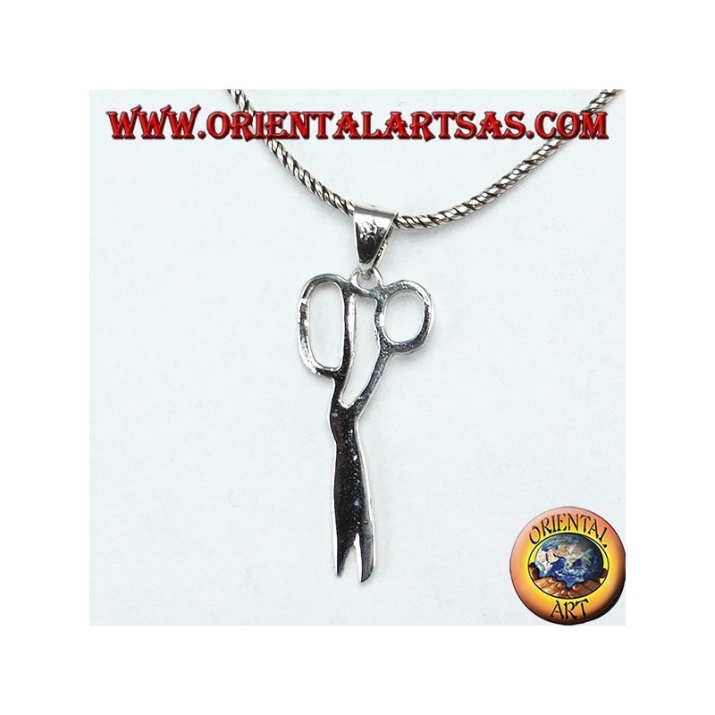 Silver pendant in the shape of scissors