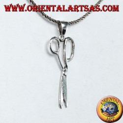 Silver pendant in the shape of scissors
