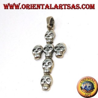 Silver pendant of a cross made up of six skulls