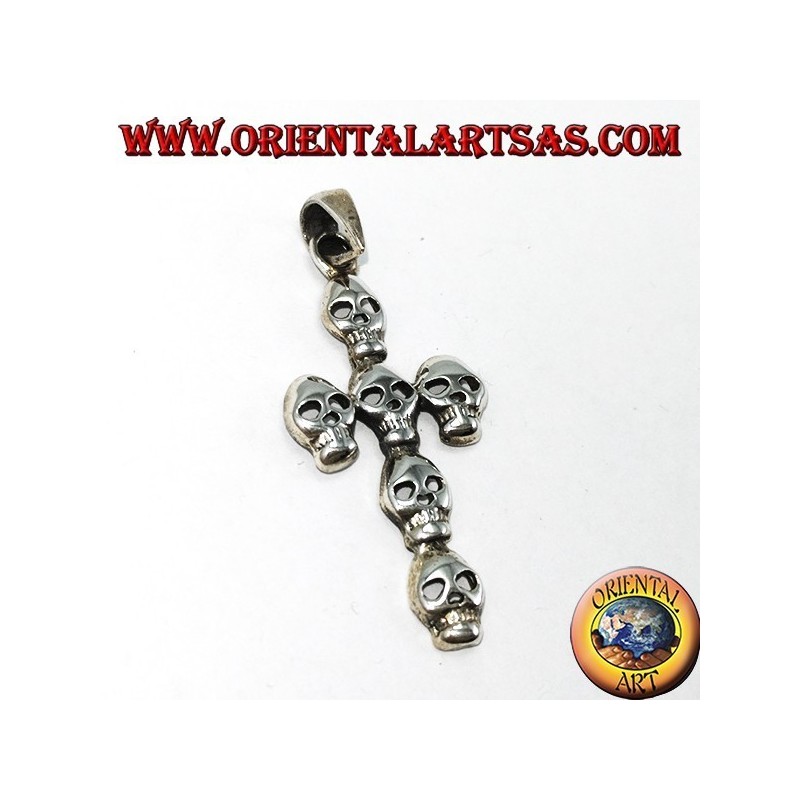 Silver pendant of a cross made up of six skulls
