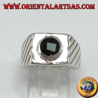 Silver ring with raised round onyx on a square base