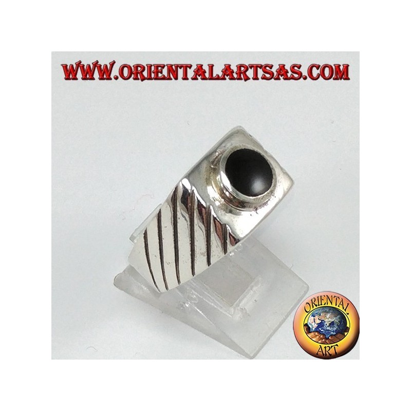 Silver ring with raised round onyx on a square base