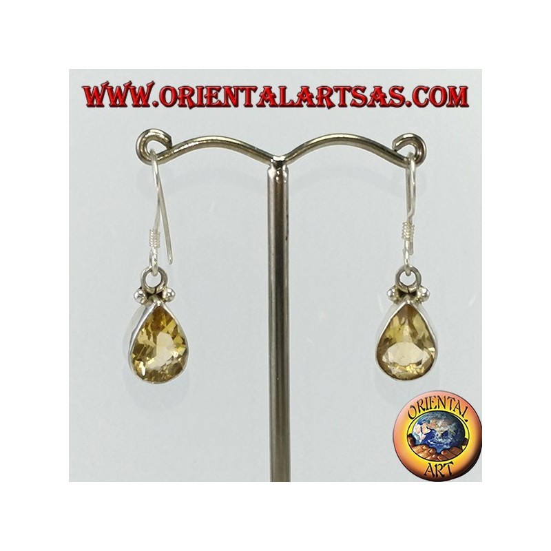 Silver earrings with faceted teardrop topaz set