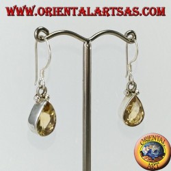 Silver earrings with faceted teardrop topaz set