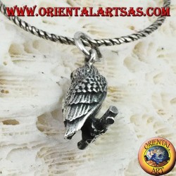 Pendant in silver owl on the three-dimensional branch