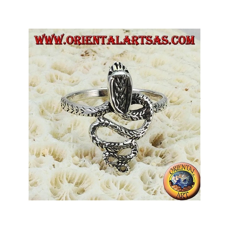 Silver ring in the shape of a cobra snake