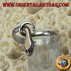 Silver snake ring with a gold plate above the head