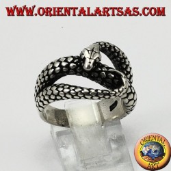 Silver ring in the shape of a cobra snake that bites