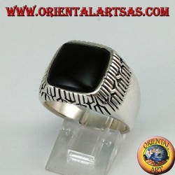 Silver ring with square onyx surrounded by engravings