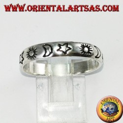 Silver ring engraved with sun and moon