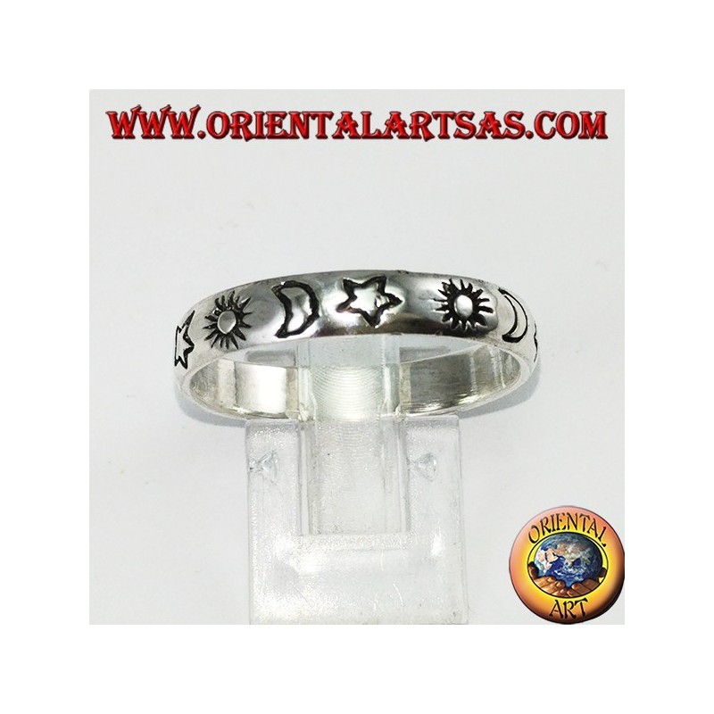 Silver ring engraved with sun and moon