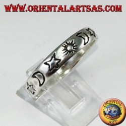 Silver ring engraved with sun and moon