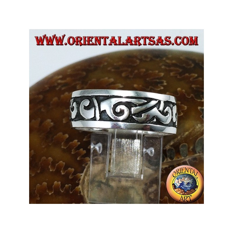 Silver band ring with Maori inlays