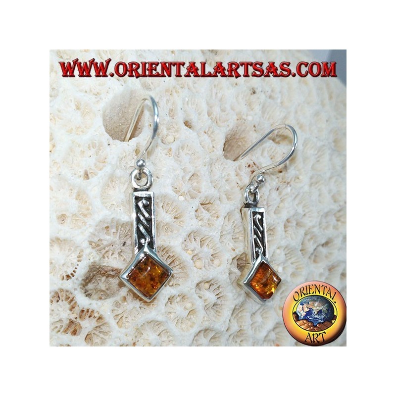 Silver earrings inlaid with square amber