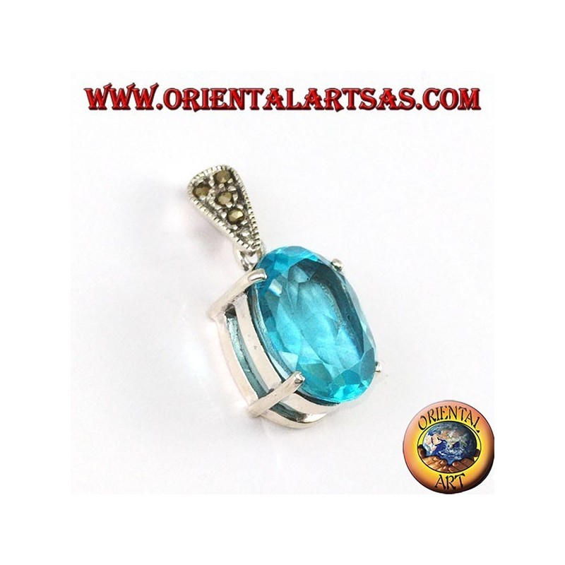 Silver pendant with oval blue Topaz set