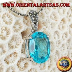 Silver pendant with oval blue Topaz set