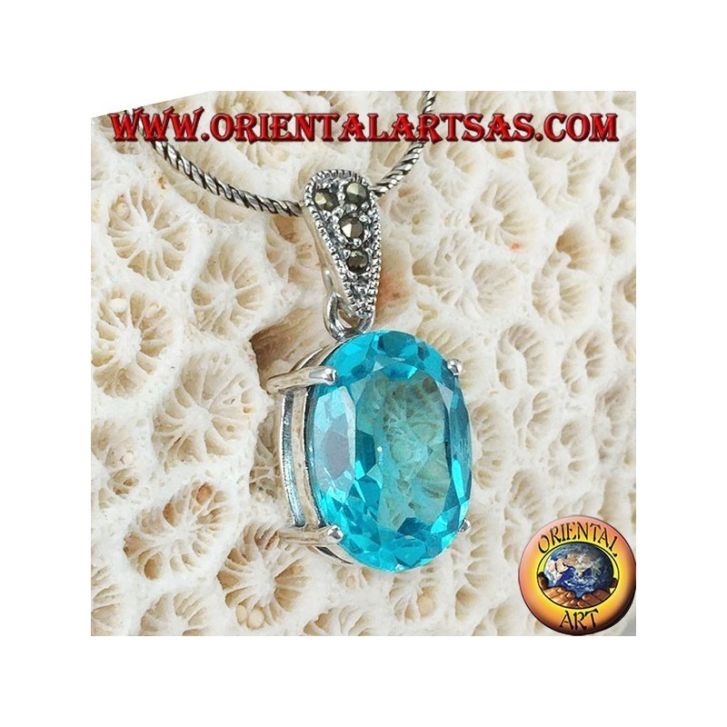 Silver pendant with oval blue Topaz set