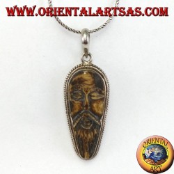 Silver pendant in old wise carved in yack bone