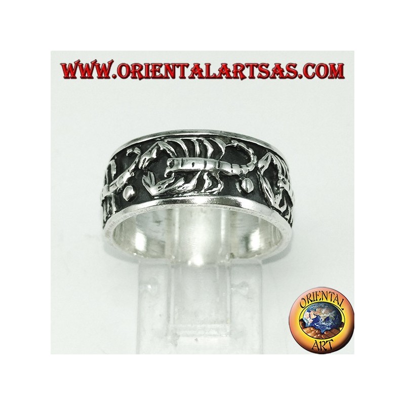Silver band ring with bas-relief scorpions