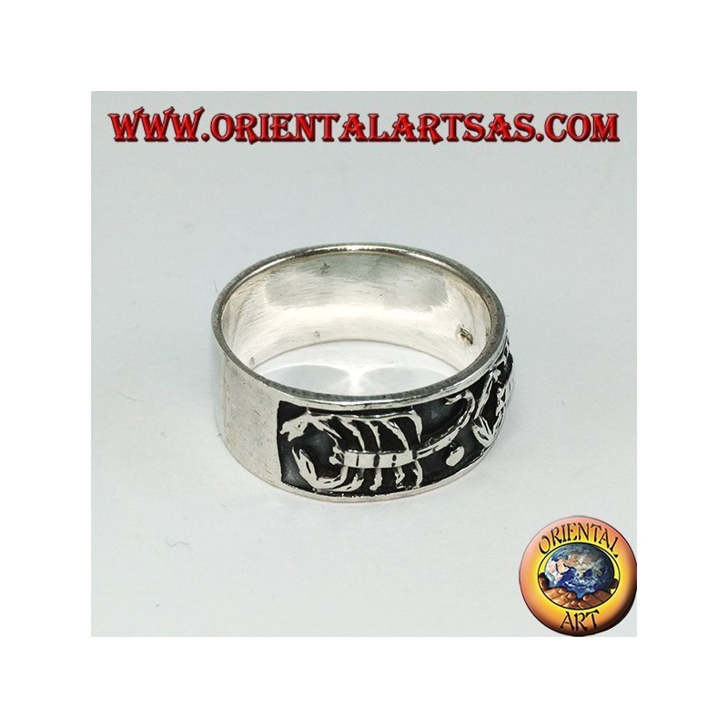 Silver band ring with bas-relief scorpions