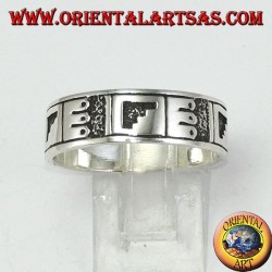 Band ring in silver with Maya low relief