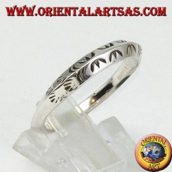Silver ring with triangular profile carved by hand