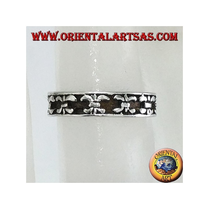 Silver ring from feet or phalanx with lilies