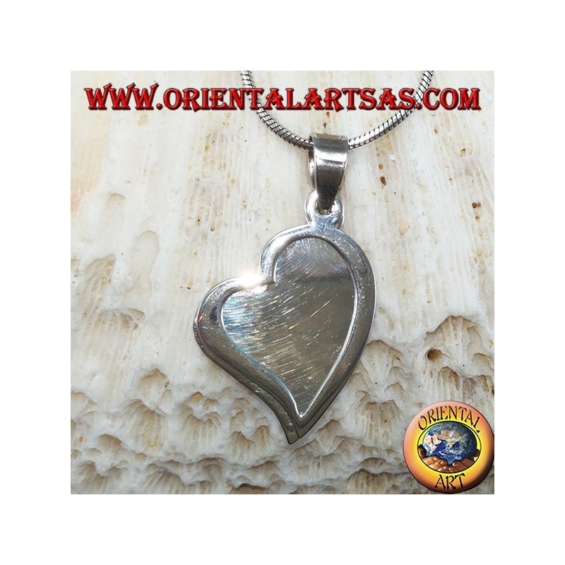 Silver pendant with two hearts, one of which is pierced