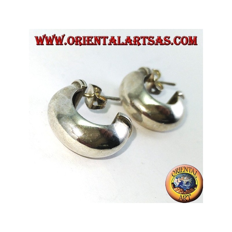 Wide silver hoop earrings with a butterfly clasp