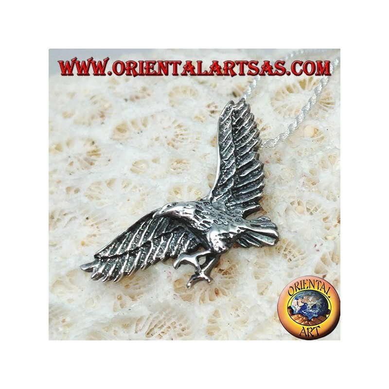 Colgante de plata, águila dorada