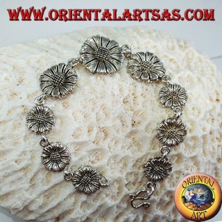 Pulsera de plata en forma de margaritas