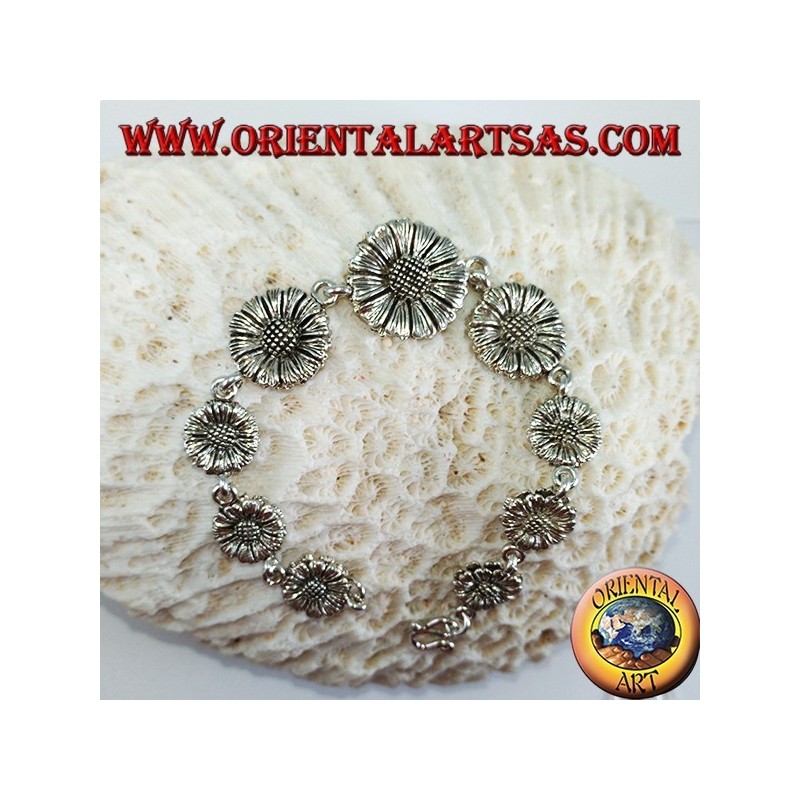 Pulsera de plata en forma de margaritas