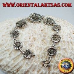 Pulsera de plata en forma de margaritas