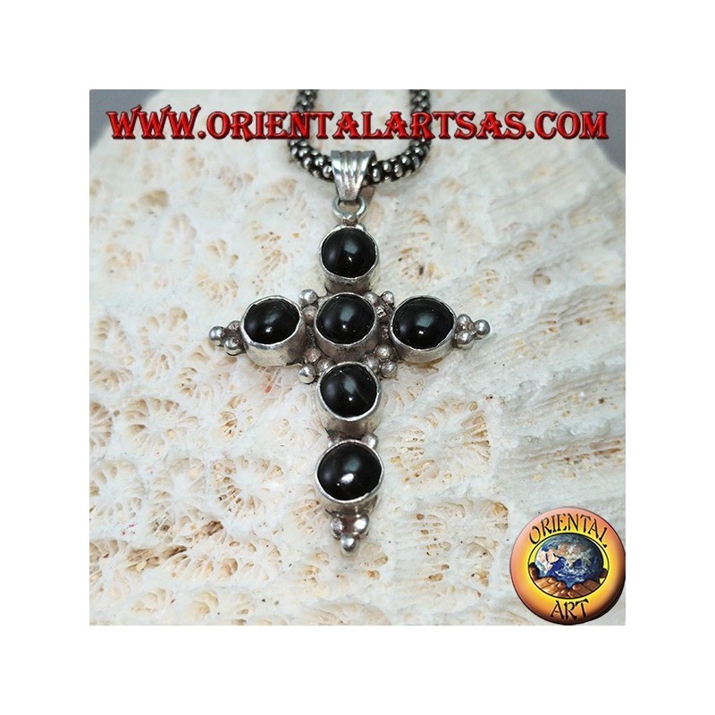 Silver cross pendant with six round black stars