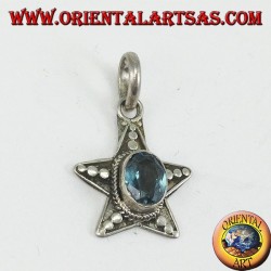Silver star pendant with oval blue Topaz